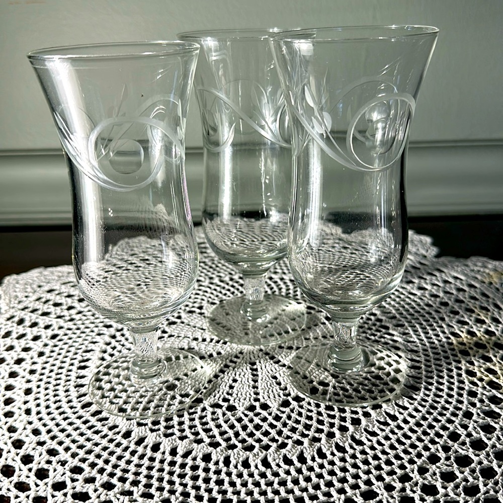 Small champagne flutes. Etched. Pretty.